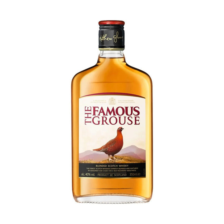 Famous Grouse whisky bottle on a clean white background